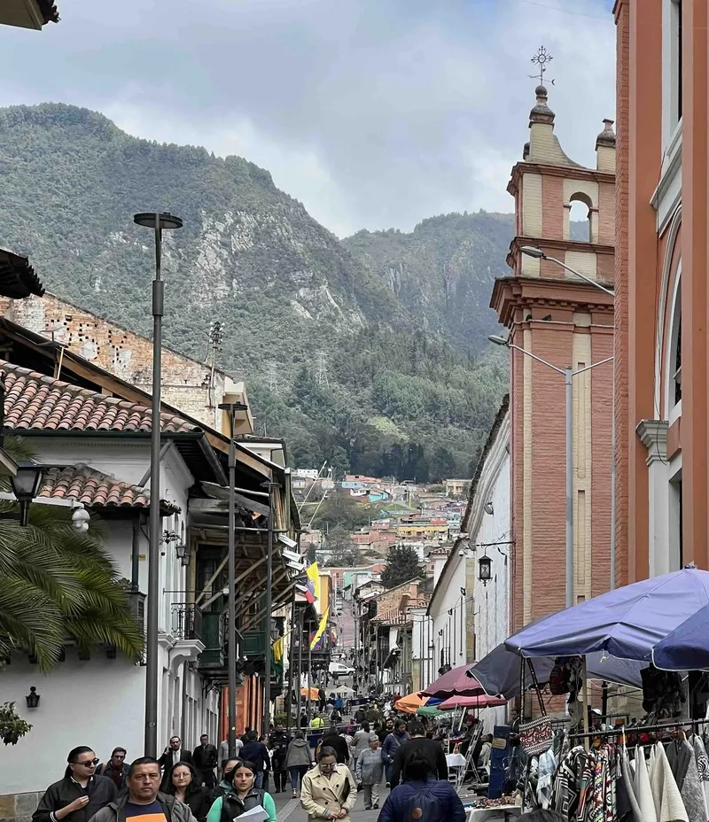 Busy street with mountains in the background